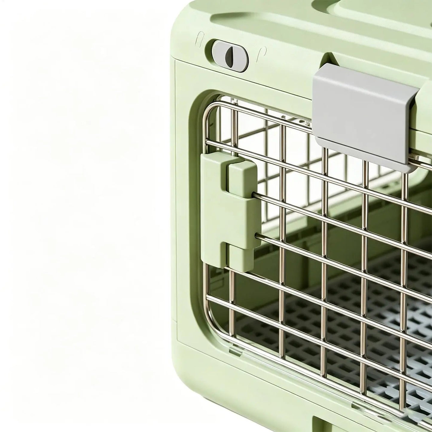 Caisse de transport pour chien – zoom sur la porte grille inox et le système de verrouillage sécurisé