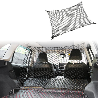 grille de protection coffre noire installée dans un SUV avec crochets élastiques rouges